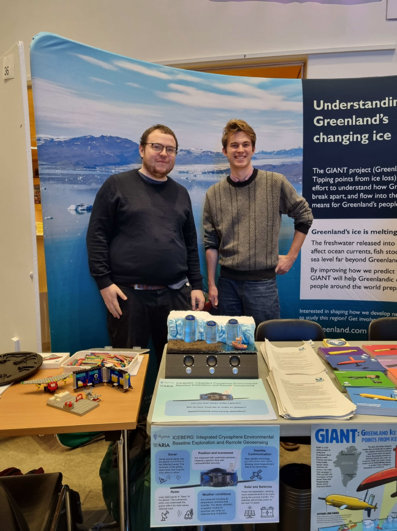 Team member smiling by the ice